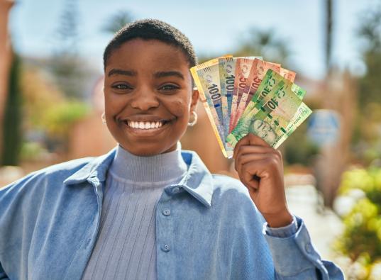 Female holding cash