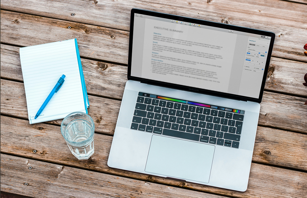 laptop with note pad