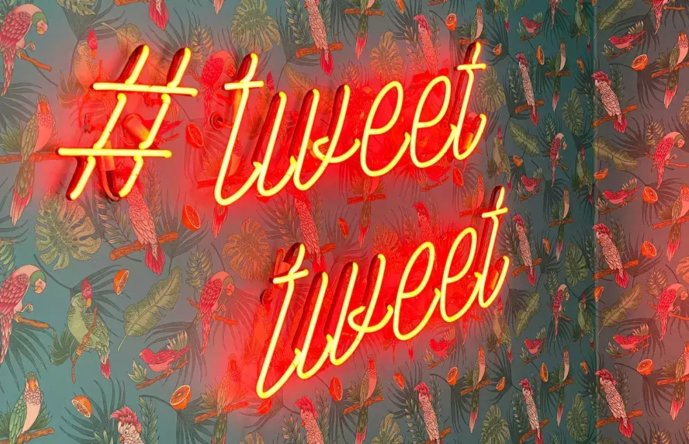 Tweet tweet red neon sign