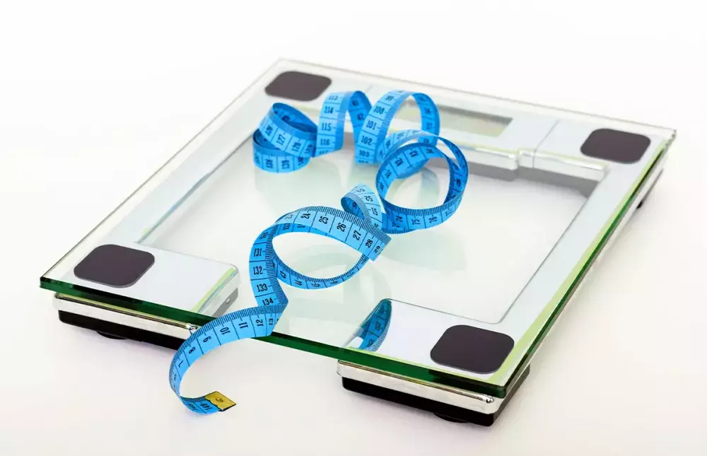 Scale and blue measuring tape