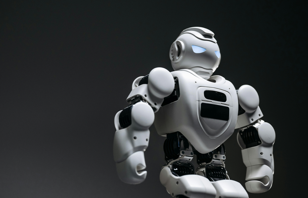 White Robot with a grey background